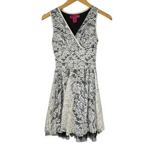 Demanding Black and White Lace Mini Dress